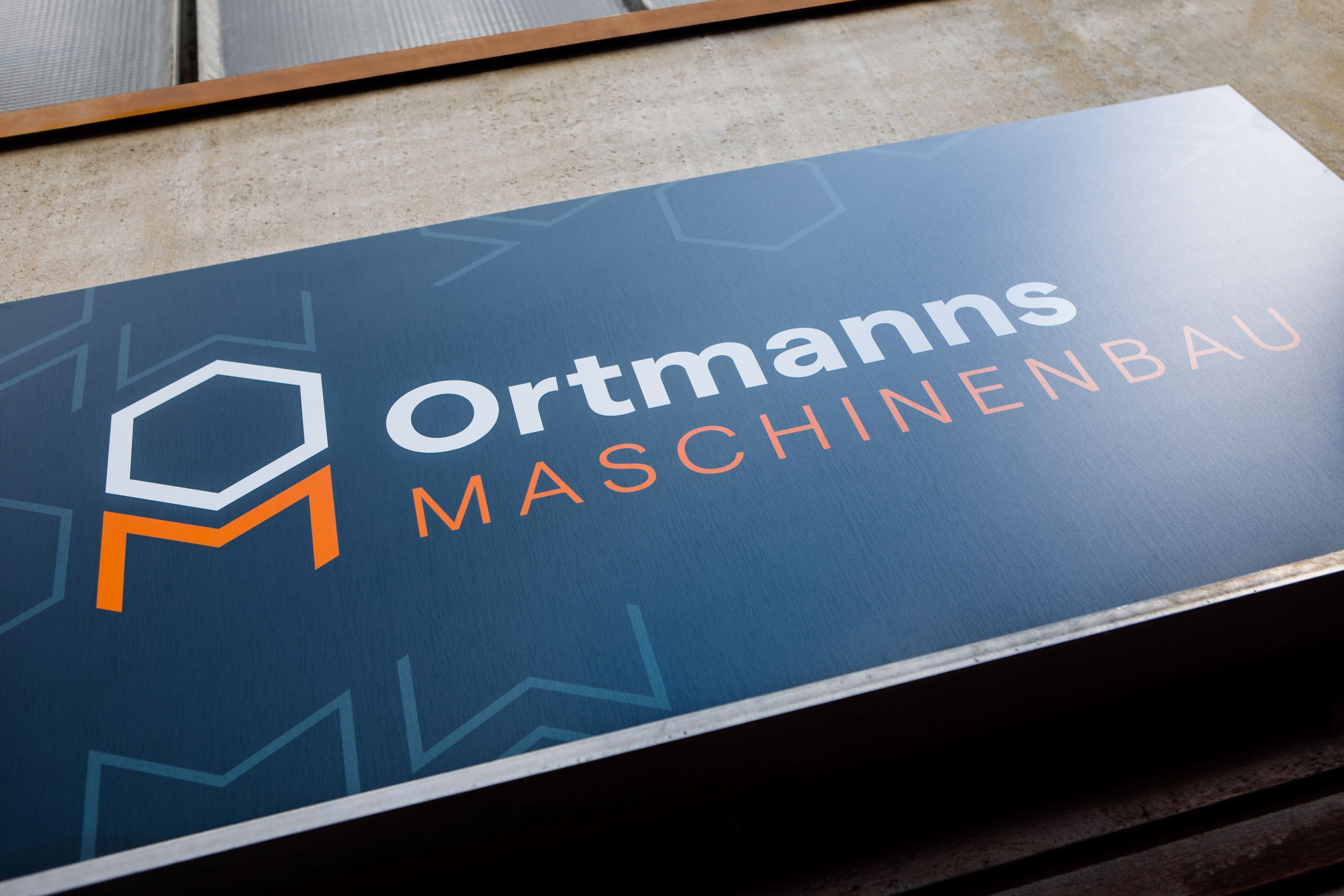 Ortmanns Maschinenbau Logo